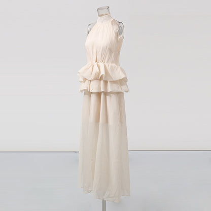 Robe longue à volants sans manches, col montant, couleur unie